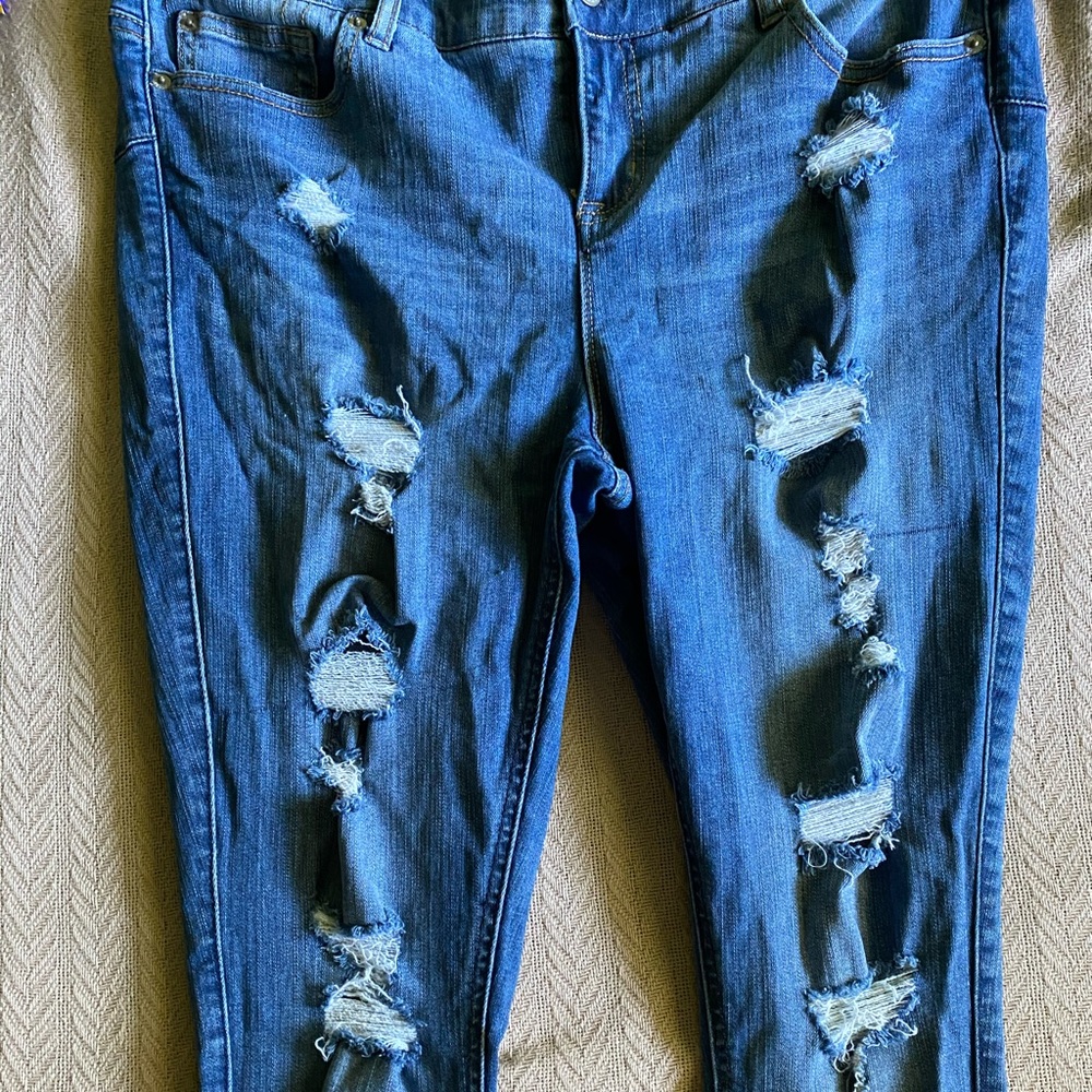Torrid Bombshell ripped skinny jeans